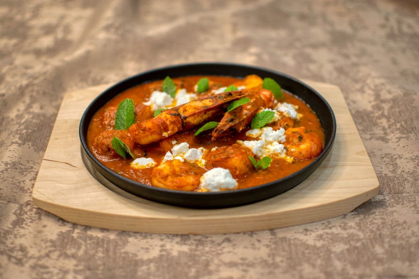 Coastal prawns in a dark Mangalorean masala